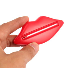 Prensa Tubo Pasta Dental Labios Rojos