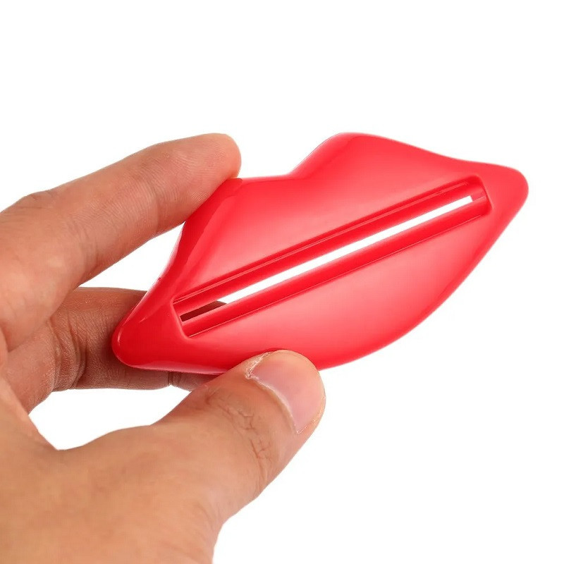 Prensa Tubo Pasta Dental Labios Rojos