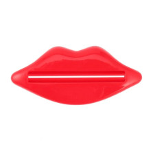 Prensa Tubo Pasta Dental Labios Rojos